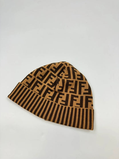 Fendi brown and mustard wool beanie featuring iconic FF monogram pattern.