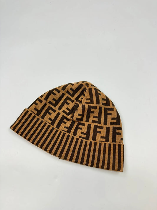 Fendi brown and mustard wool beanie featuring iconic FF monogram pattern.