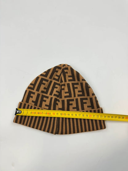 Fendi brown and mustard wool beanie featuring iconic FF monogram pattern.