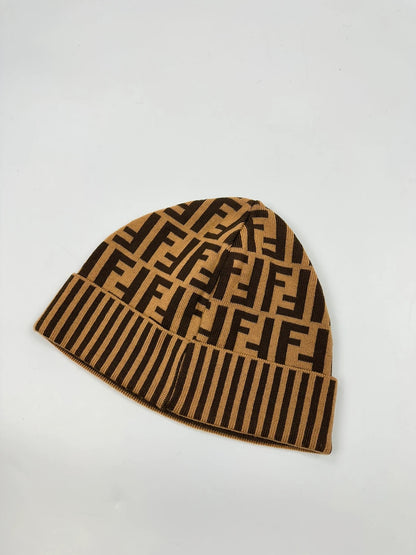 Fendi brown and mustard wool beanie featuring iconic FF monogram pattern.