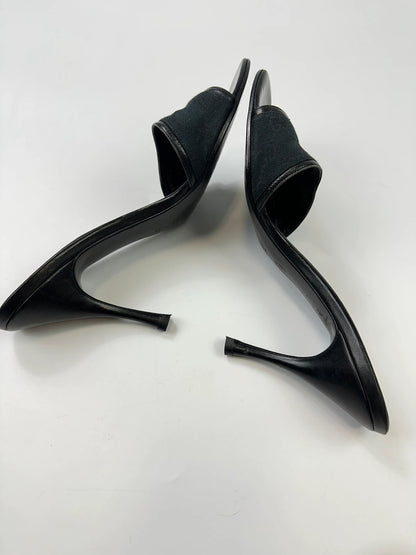 Gucci black heels with canvas monogram pattern and leather accents from the 2000s.