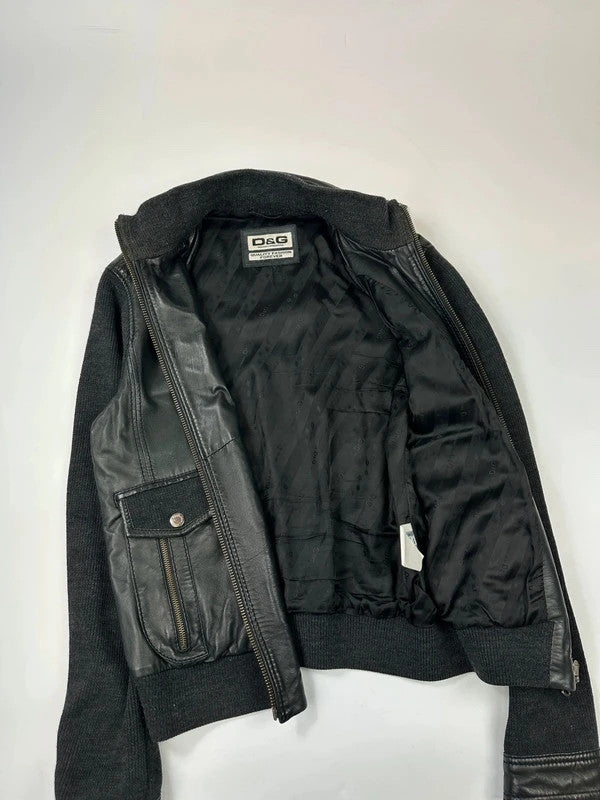 Dolce & Gabbana black bomber jacket with hybrid lamb leather and wool sleeves.