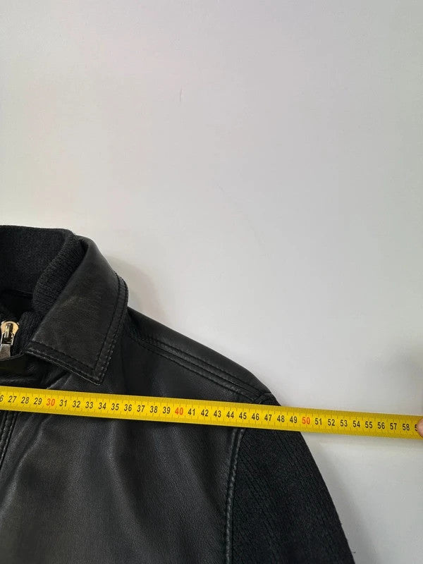 Dolce & Gabbana black bomber jacket with hybrid lamb leather and wool sleeves.