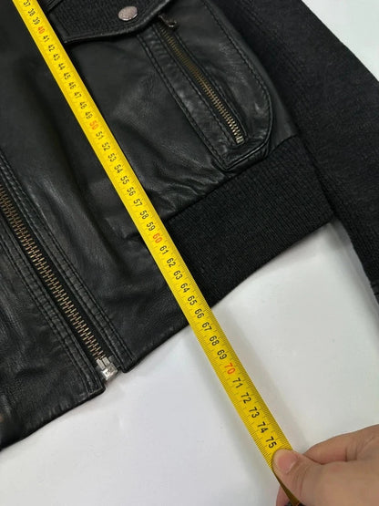 Dolce & Gabbana black bomber jacket with hybrid lamb leather and wool sleeves.