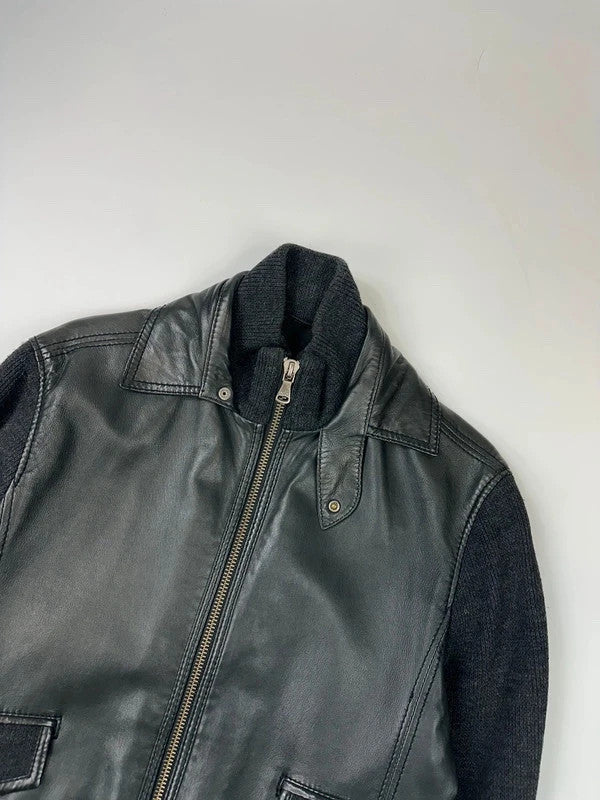 Dolce & Gabbana black bomber jacket with hybrid lamb leather and wool sleeves.