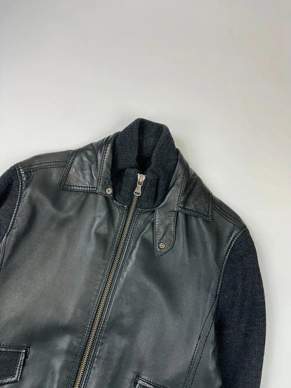 Dolce & Gabbana black bomber jacket with hybrid lamb leather and wool sleeves.