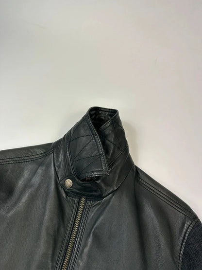 Dolce & Gabbana black bomber jacket with hybrid lamb leather and wool sleeves.