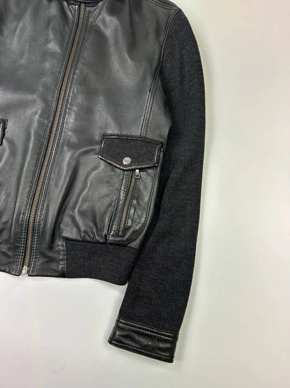 Dolce & Gabbana black bomber jacket with hybrid lamb leather and wool sleeves.