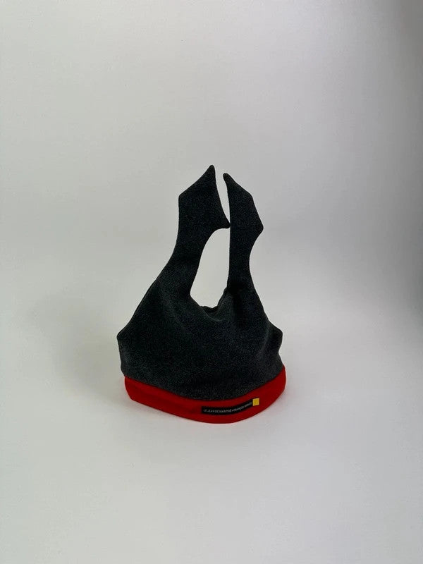 Marithé Francois Girbaud grey and red beanie with devil horns and logo detail.