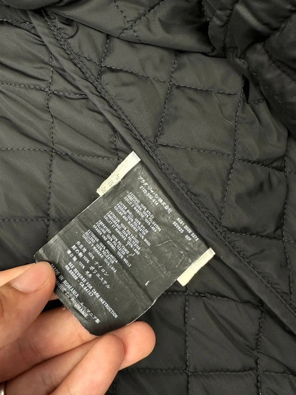 Prada black hybrid jacket with padded nylon body and wool sleeves, vintage 2006 collection.