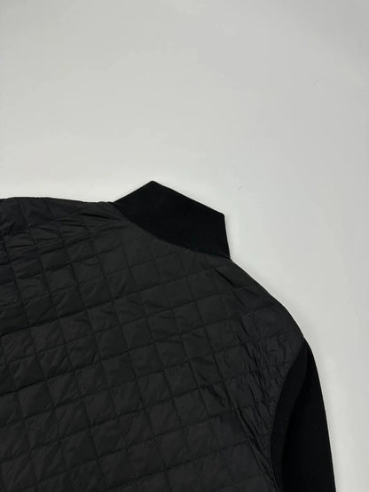 Prada black hybrid jacket with padded nylon body and wool sleeves, vintage 2006 collection.