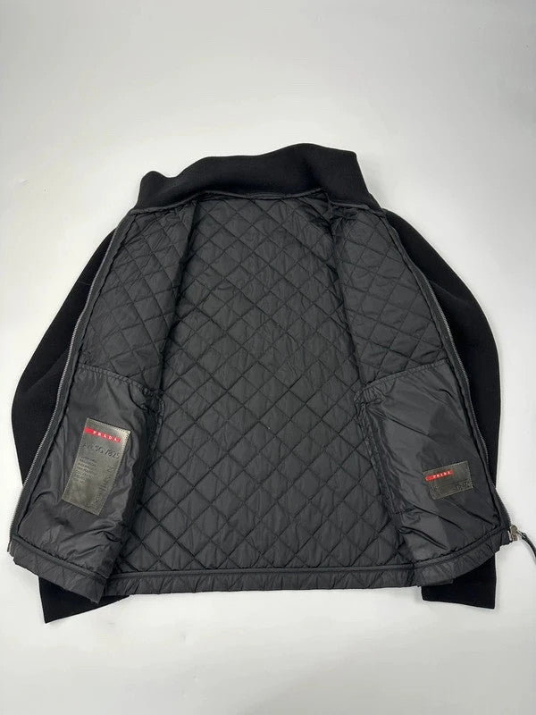 Prada black hybrid jacket with padded nylon body and wool sleeves, vintage 2006 collection.