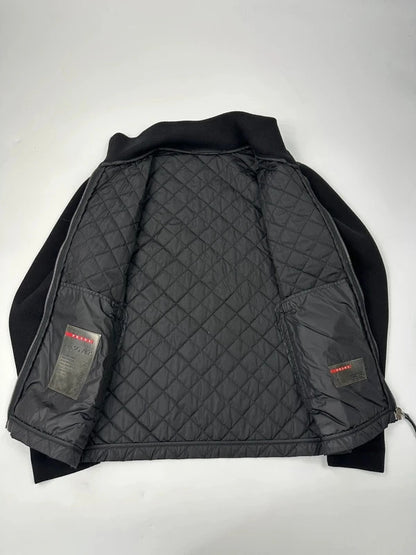 Prada black hybrid jacket with padded nylon body and wool sleeves, vintage 2006 collection.