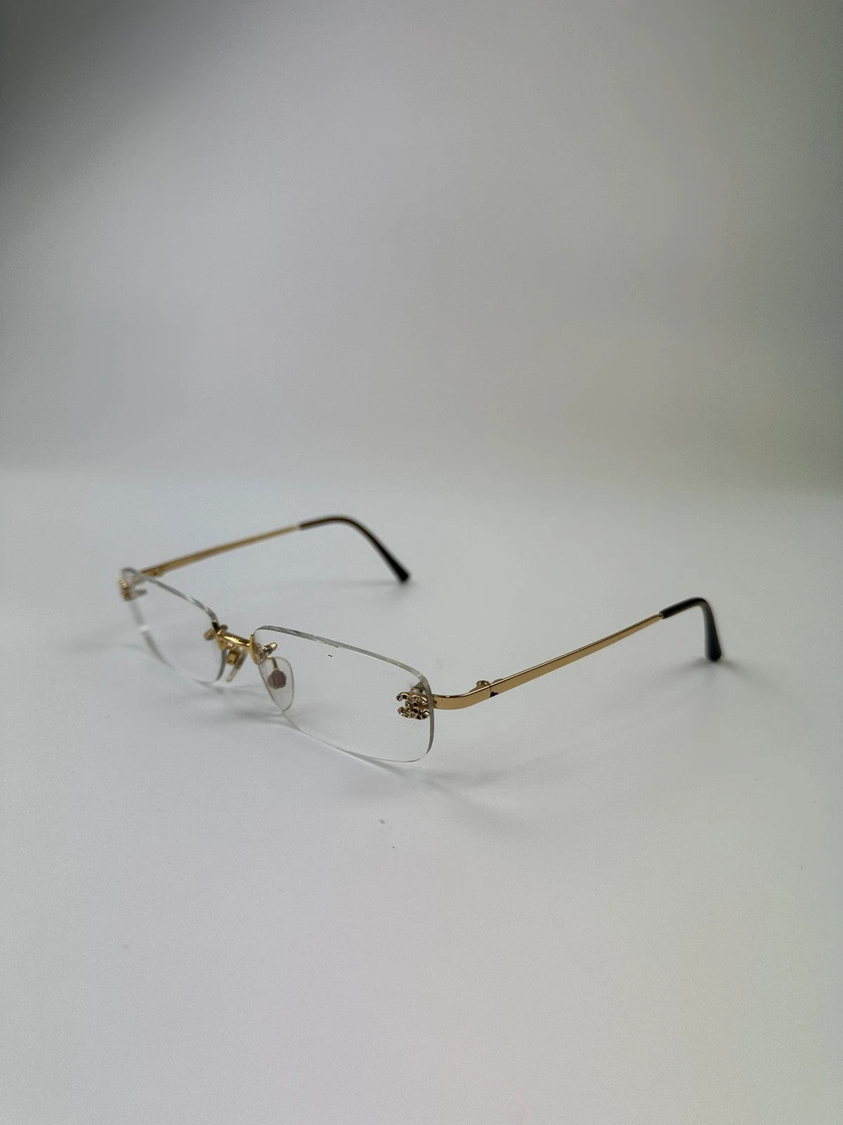 Chanel White Argent Gold Sunglasses Rimless Strass